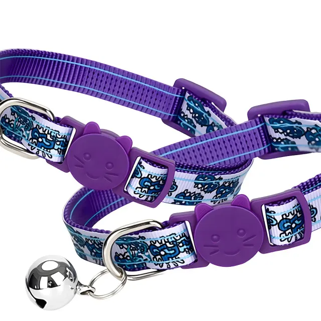 Purple printed breakaway cat collars with cat-shaped buckle and silver bell