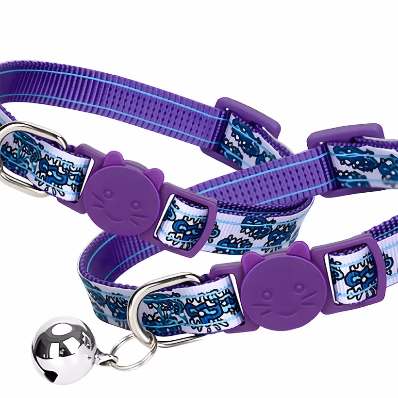 Purple printed breakaway cat collars with cat-shaped buckle and silver bell